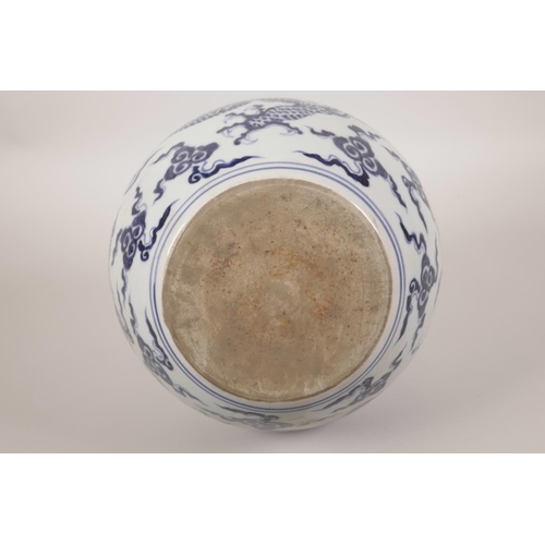 15 - A Chinese blue and white pottery vase with dragon decoration, 6 character mark to side, 11