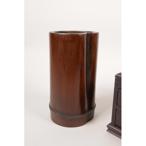 18 - A Chinese bamboo brush pot, together with a Chinese hardwood desktop mirror in the form of a three d... 