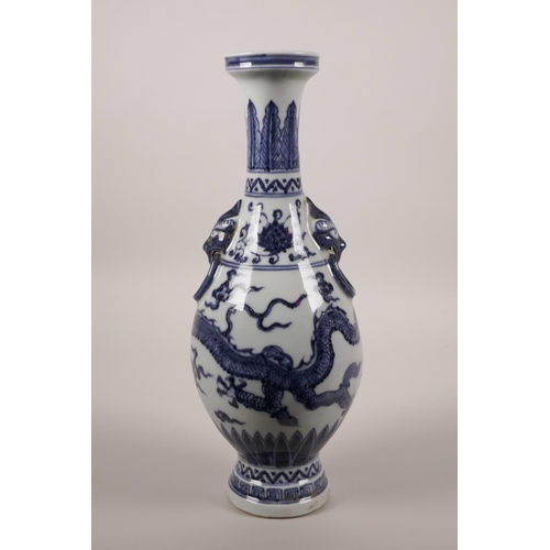 30 - A Chinese blue and white pottery vase with two mask handles and dragon decoration, 6 character mark ... 