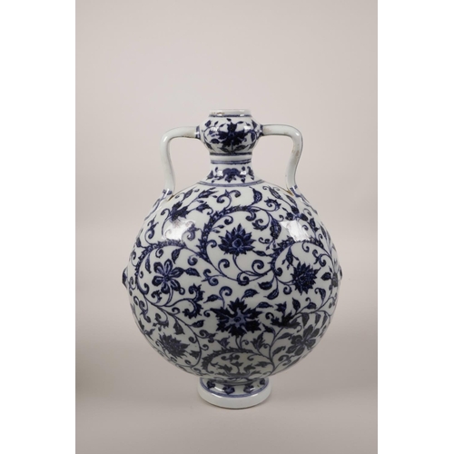 33 - A Chinese blue and white porcelain two handled moon flask with scrolling lotus flower decoration, 6 ... 