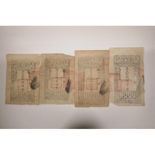 48 - A collection of four Chinese facsimile (replica) bank cheques, largest 6