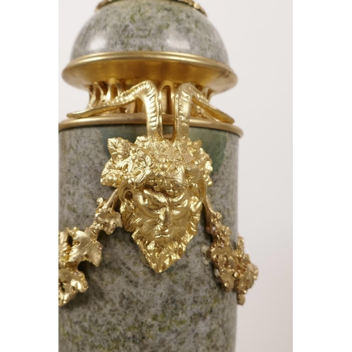 51 - A pair of ormolu mounted marble cassoulets decorated with vine swags and masks of the god Pan, 12½