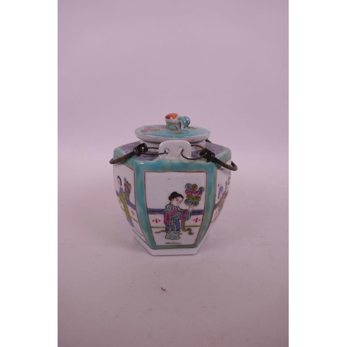 21 - A Chinese polychrome enamelled porcelain teapot of hexagonal form, with decorative panels depicting ... 