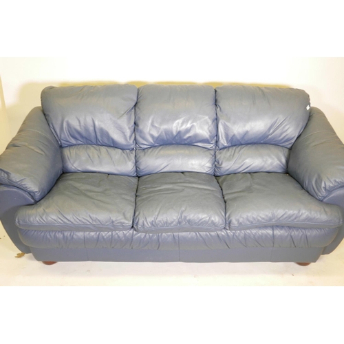 1108 - A blue leather three seater sofa, 84