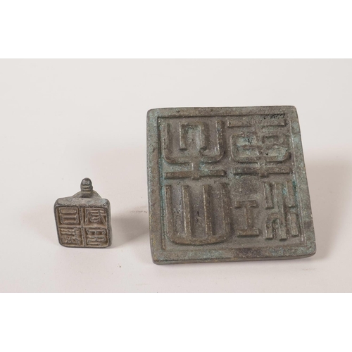 15 - A Chinese bronze seal with applied gilt and verdigris patina, together with another smaller, 3