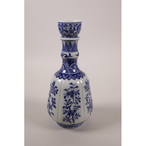 16 - A Chinese blue and white porcelain vase with floral decoration, seal mark to base, 9