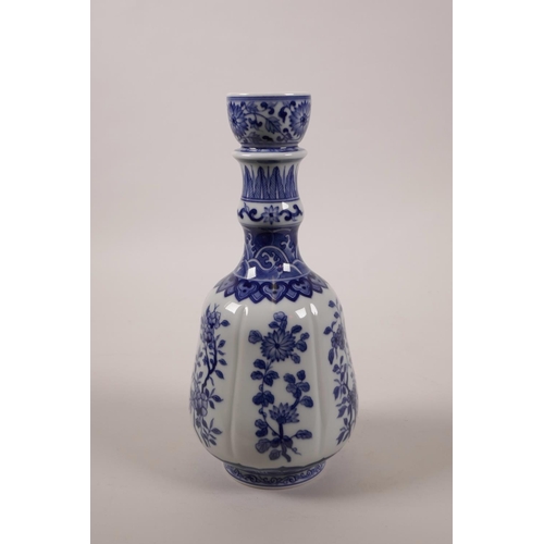 16 - A Chinese blue and white porcelain vase with floral decoration, seal mark to base, 9