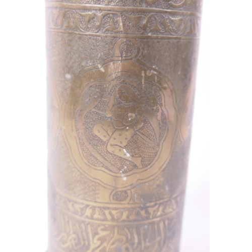 25 - Trench Art, a brass shell case engraved with panels of figures, Persian patterns and script, signed ... 