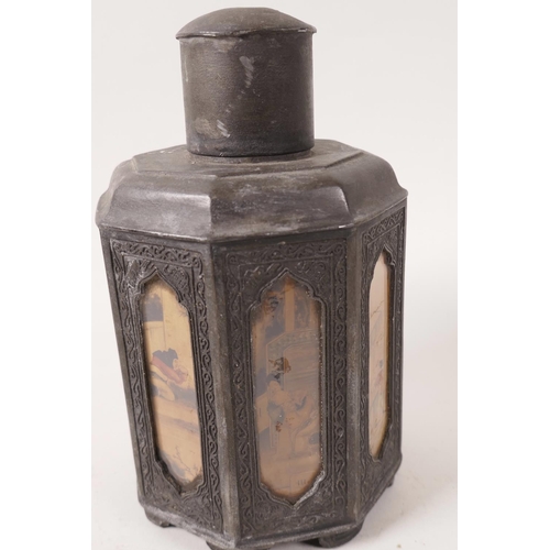 27 - A Japanese antimony tea caddy of octagonal form, with glazed panels of domestic scenes, 7½