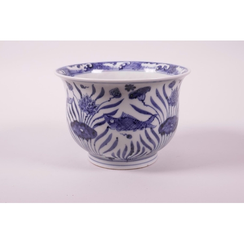 43 - A Chinese blue and white porcelain steep sided bowl decorated with carp in a lotus pond, 4