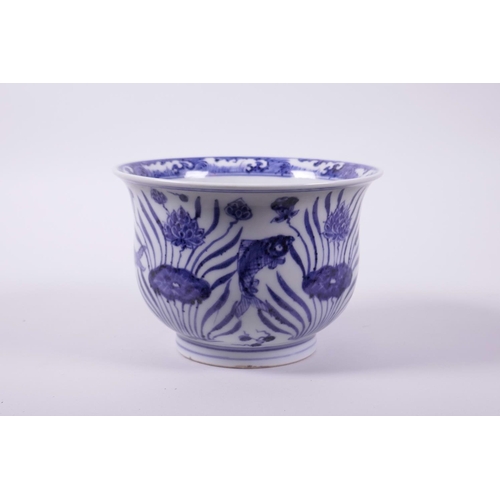 43 - A Chinese blue and white porcelain steep sided bowl decorated with carp in a lotus pond, 4