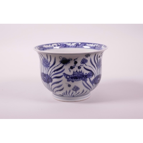 43 - A Chinese blue and white porcelain steep sided bowl decorated with carp in a lotus pond, 4