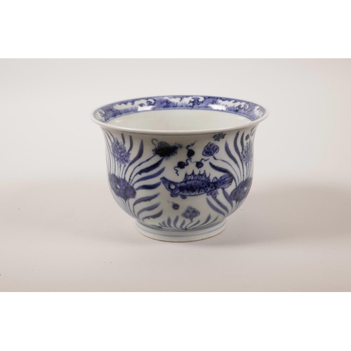 43 - A Chinese blue and white porcelain steep sided bowl decorated with carp in a lotus pond, 4