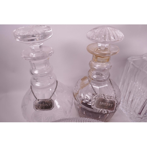 7 - Two C19th glass decanters with hallmarked silver sherry and whisky labels, together with a square cu... 