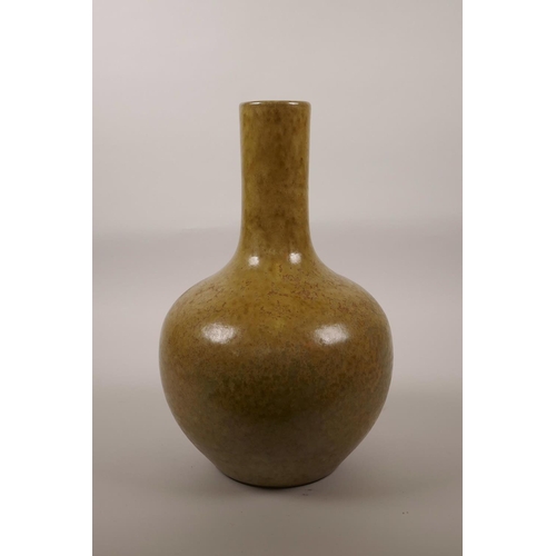 50 - A Chinese ochre glazed pottery bottle vase, 4 character mark to base, 12½