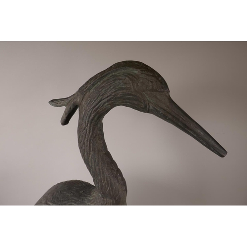 9 - A metal garden figure of a heron, 29