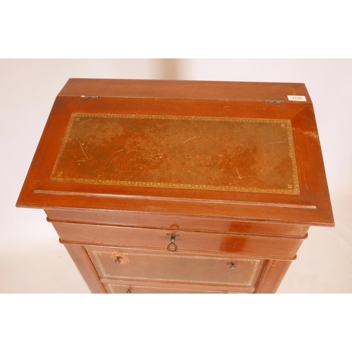 1137 - A French mahogany clerk's desk, with inset  leather fall front' single drawer and slide out pen tray... 