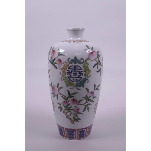 23 - A Chinese polychrome enamelled porcelain vase decorated with fruiting peach branches, bats and auspi... 