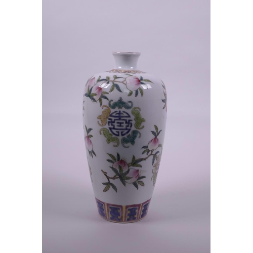 23 - A Chinese polychrome enamelled porcelain vase decorated with fruiting peach branches, bats and auspi... 