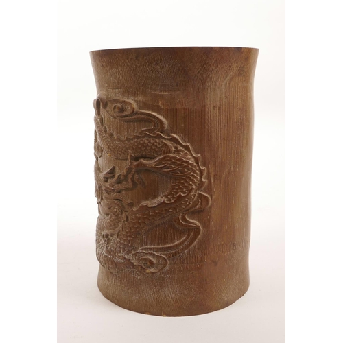 31 - A Chinese bamboo brush pot with carved dragon decoration, 7