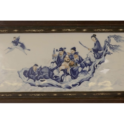 40 - A large Chinese blue and white porcelain panel decorated with The Eight Immortals travelling at sea,... 