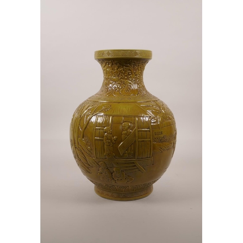 50 - A large Chinese ochre glazed pottery vase with raised decoration of everyday village life, impressed... 