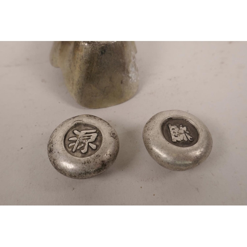 59 - A pair of small Chinese white metal trade tokens, and another larger, largest 2½