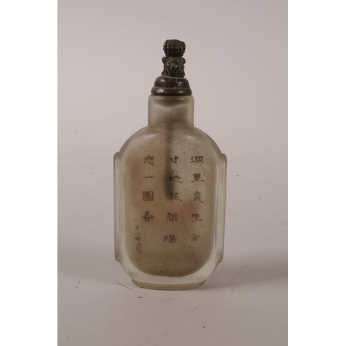 15 - A Chinese reverse painted glass snuff bottle with erotic scene, character inscription verso, 3½