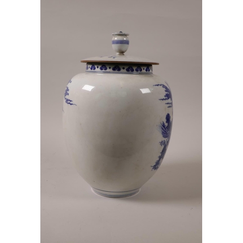 33 - A Chinese blue and white jar and cover decorated with travellers in a buffalo-drawn cart, 6 characte... 