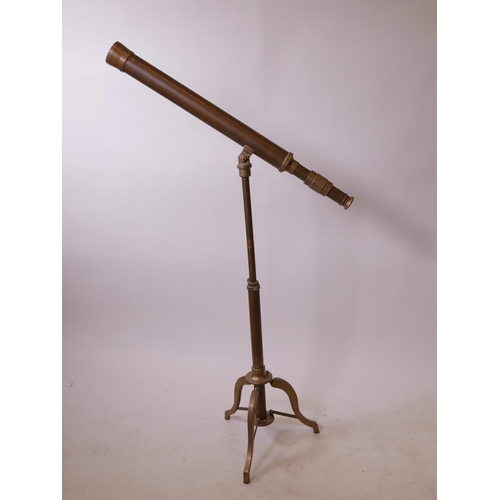 39 - A brass telescope and stand, 27