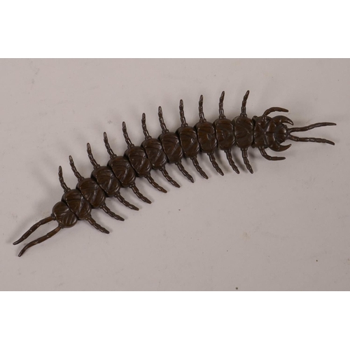 52 - An articulated bronze figure of a centipede, 6