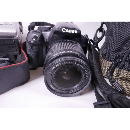 53 - A Canon EOS 450D digital camera with image stabiliser lens, together with a Fujifilm Finepix 6900Z d... 