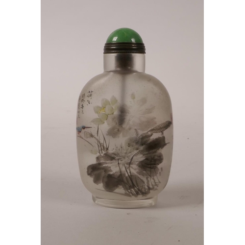 62 - A Chinese reverse painted glass snuff bottle decorated with a bearded figure and red crowned crane i... 