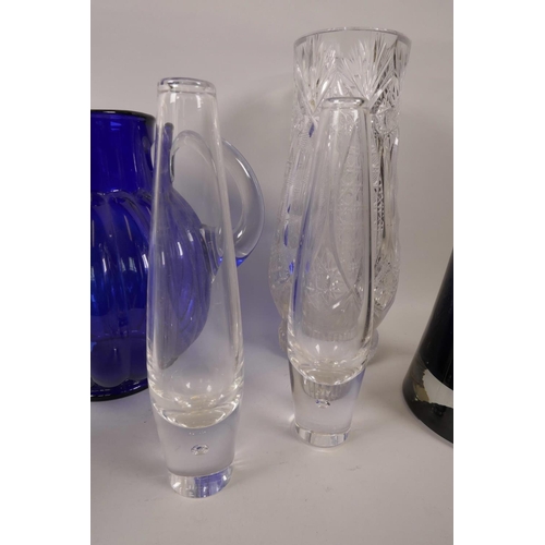 67 - A heavy cut glass vase on pedestal foot, 10