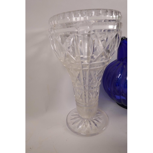 67 - A heavy cut glass vase on pedestal foot, 10