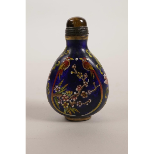 10 - A Peking glass snuff bottle decorated in enamels with exotic birds and flowers, 4 character mark to ... 