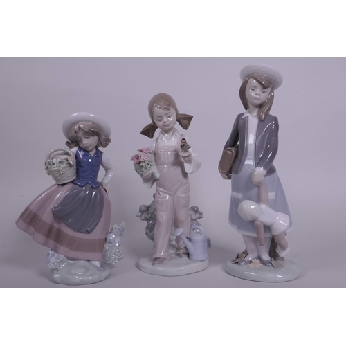 6 - Three Lladro porcelain figurines of young girls, largest 8