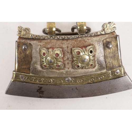 16 - A Tibetan brass, leather and steel flint purse with pierced and engraved scroll decoration, 4