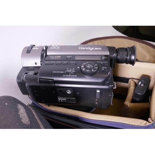 47 - Two Sony Handycam 8mm video recorders, together with a Canon UC-XI Hi8 camcorder, a Bell and Howell ... 