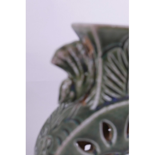 15 - A Chinese green glazed porcelain flask shaped vase with pierced sides and exotic bird handles, 9