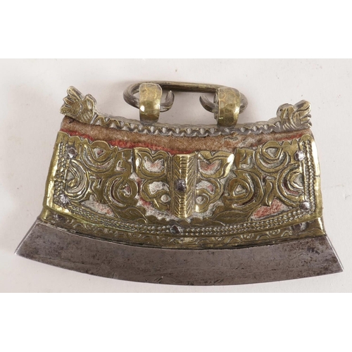 16 - A Tibetan brass, leather and steel flint purse with pierced and engraved scroll decoration, 4