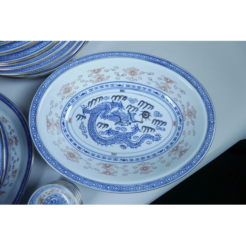 3 - A Chinese porcelain dragon pattern rice grain dinner service, comprising 10