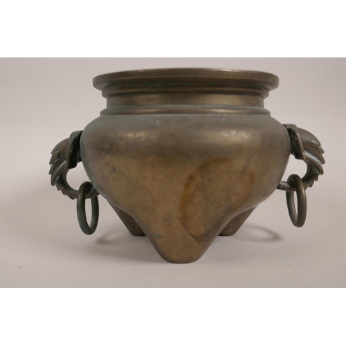 36 - A Chinese bronze censer with elephant mask ring handles, 4