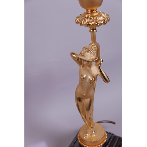 38 - A pair of Art Deco style ormolu table lamps cast in the form of nudes, on polished steel bases, 16