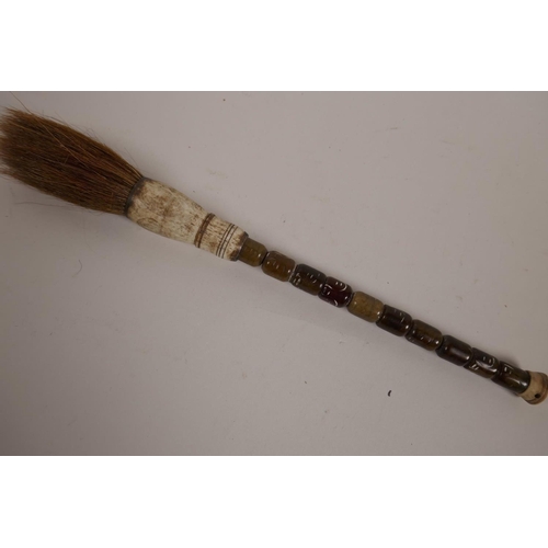 46 - A Chinese agate and bone handled calligraphy brush, 10