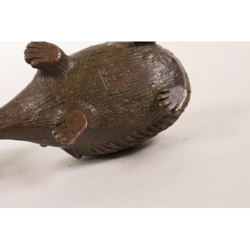 5 - A Chinese bronze figure of a hedgehog and another of a camel, 2