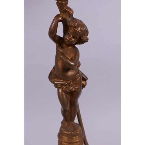 54 - An ormolu four branch, five light table candelabra, the column cast as a young boy, A/F, 22