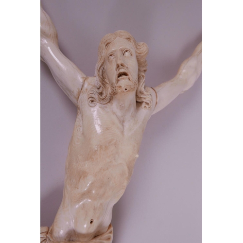 60 - A well carved late C18th/early C19th ivory Corpus Christie, 20½