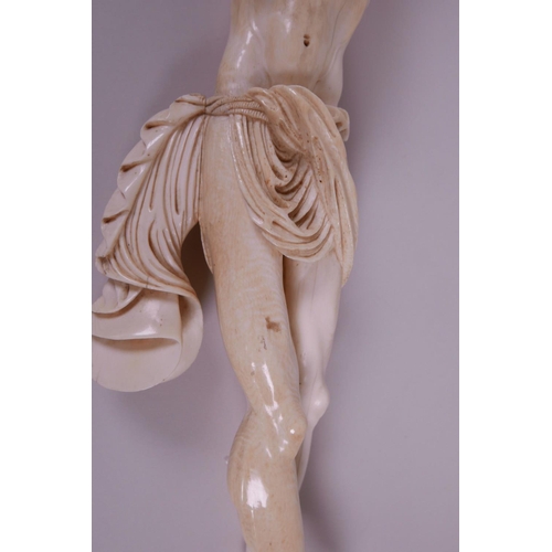 60 - A well carved late C18th/early C19th ivory Corpus Christie, 20½