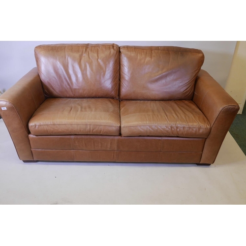 1179 - A two seater leather upholstered sofa, 78